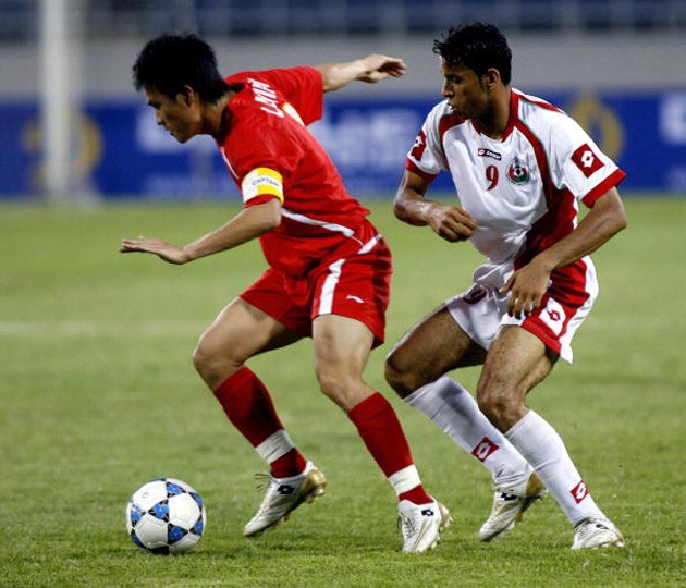 Công Vinh trong trận đấu loại Olympic Bắc Kinh gặp Oman tháng 4/2007.